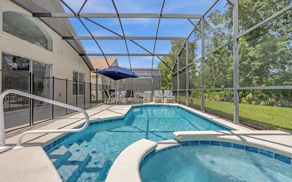 An inviting pool and deck space with plenty of seating