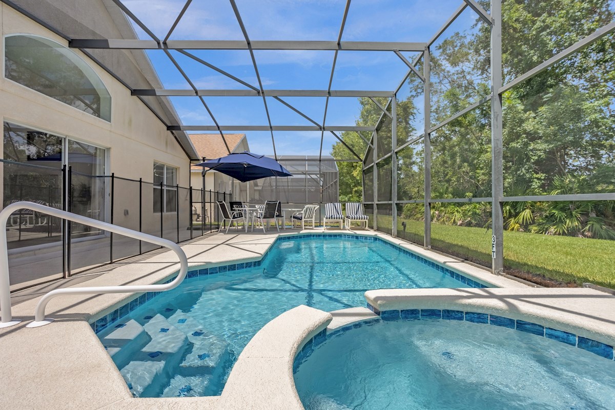 An inviting pool and deck space with plenty of seating