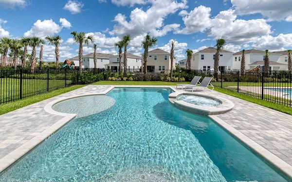 Huge south facing pool with hot tub