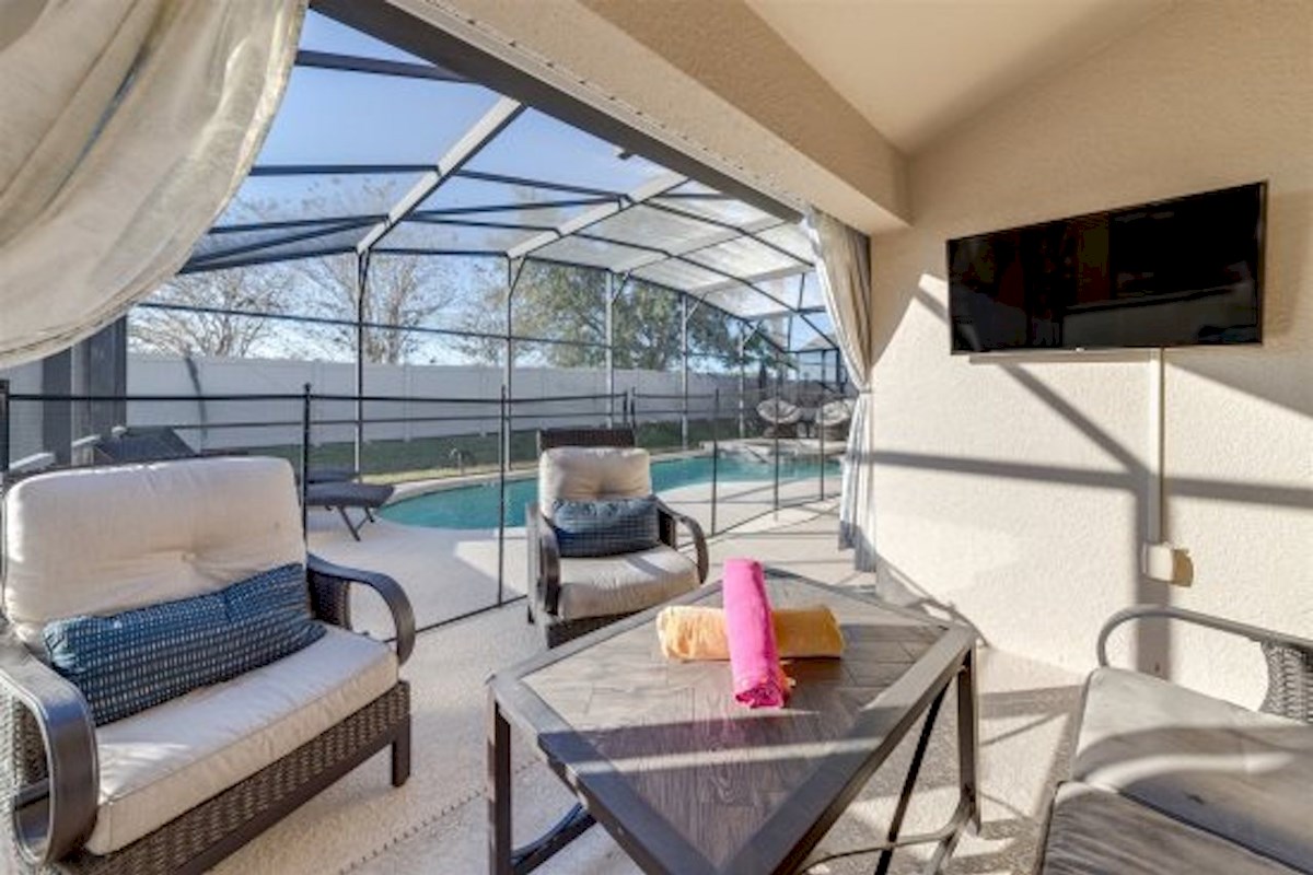 Outdoor seating area with TV